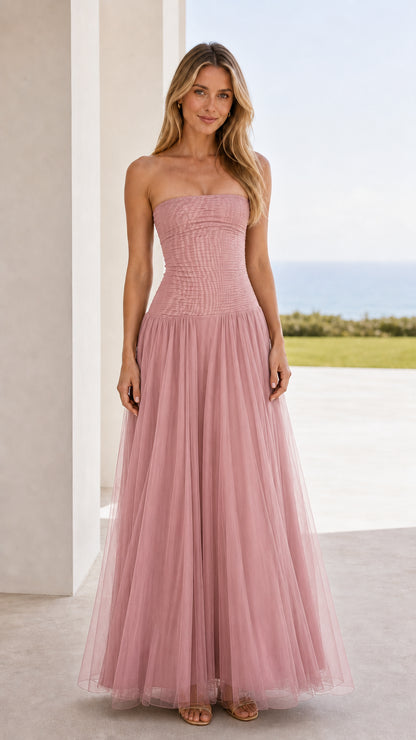 Front view of pink strapless ruched tulle maxi dress