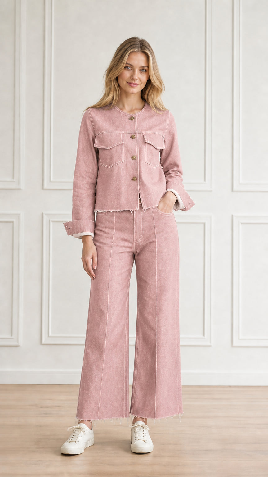 Model wearing dusty pink denim jacket and wide-leg pants co-ord set