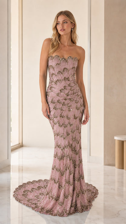 Model wearing rose gold sequin strapless mermaid evening gown