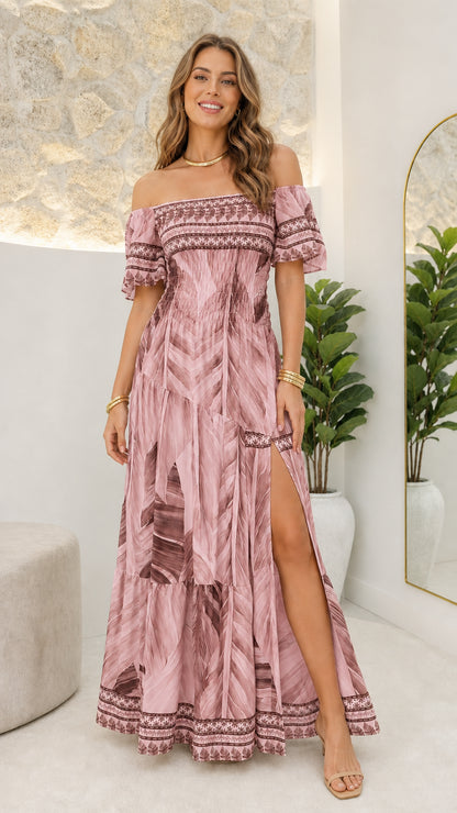 Front view of woman wearing pink boho maxi dress