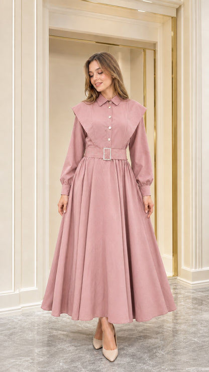 Front view of dusty pink capelet collar belted long sleeve maxi dress