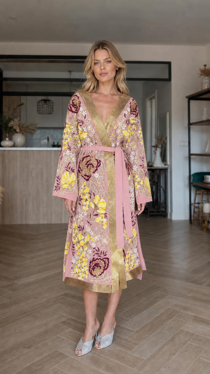 Front view of pink floral embroidered kimono robe