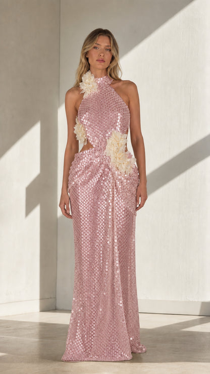 Blush pink sequin halter maxi dress with floral appliqués shown from the front