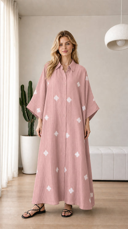Dusty pink embroidered button-down maxi shirt dress on model