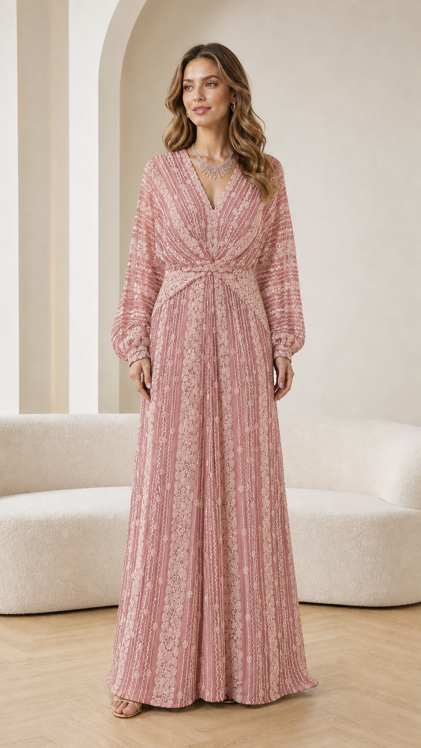 Full-length view of woman modeling dusty pink beaded long sleeve maxi dress