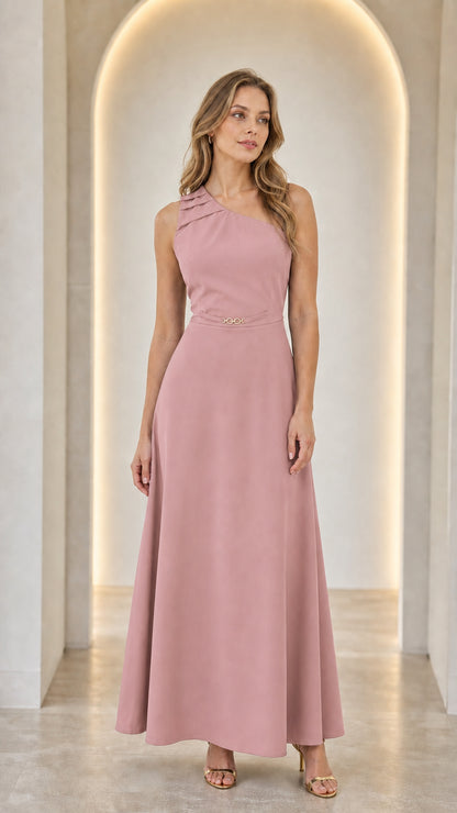 Woman wearing a pink one-shoulder pleated maxi dress