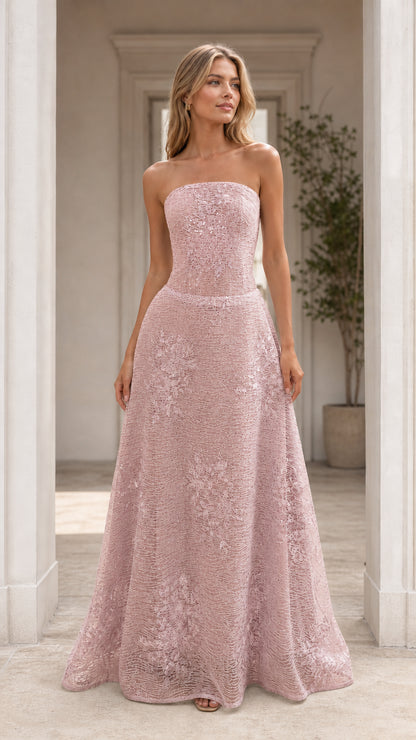 Front view of model wearing pink strapless formal evening dress