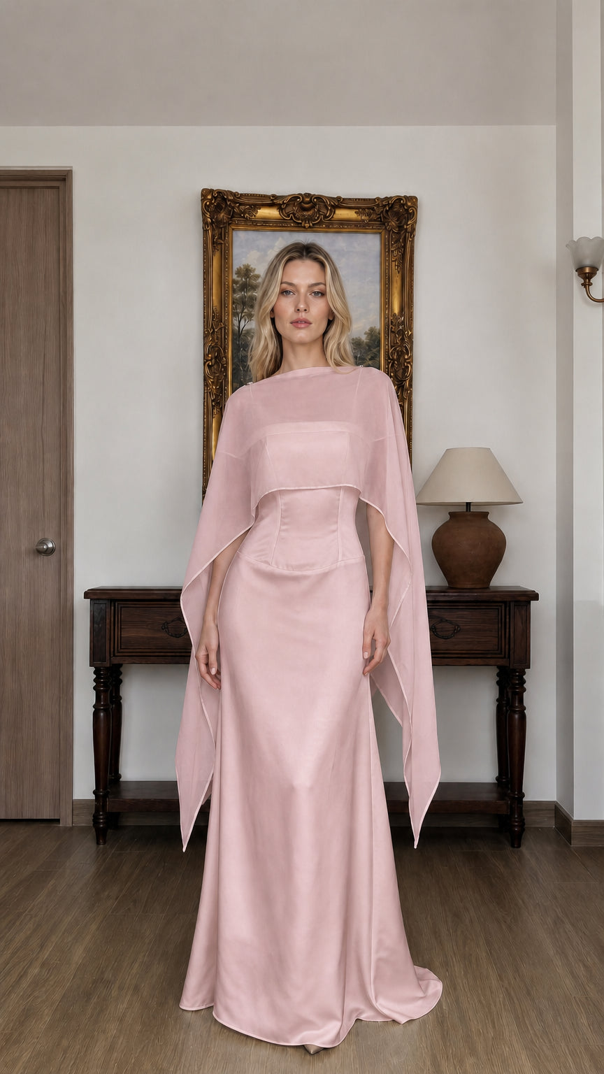 Front view of woman wearing pink cape overlay evening dress