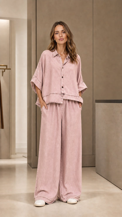 Full front view of model wearing pink two-piece pants set