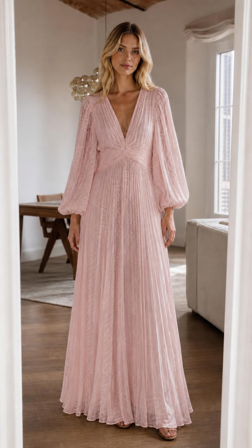 Front view of pink pleated long sleeve maxi dress