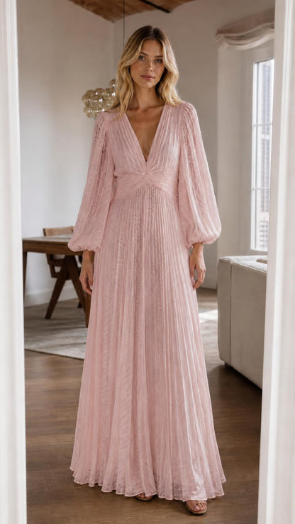 Front view of pink pleated long sleeve maxi dress