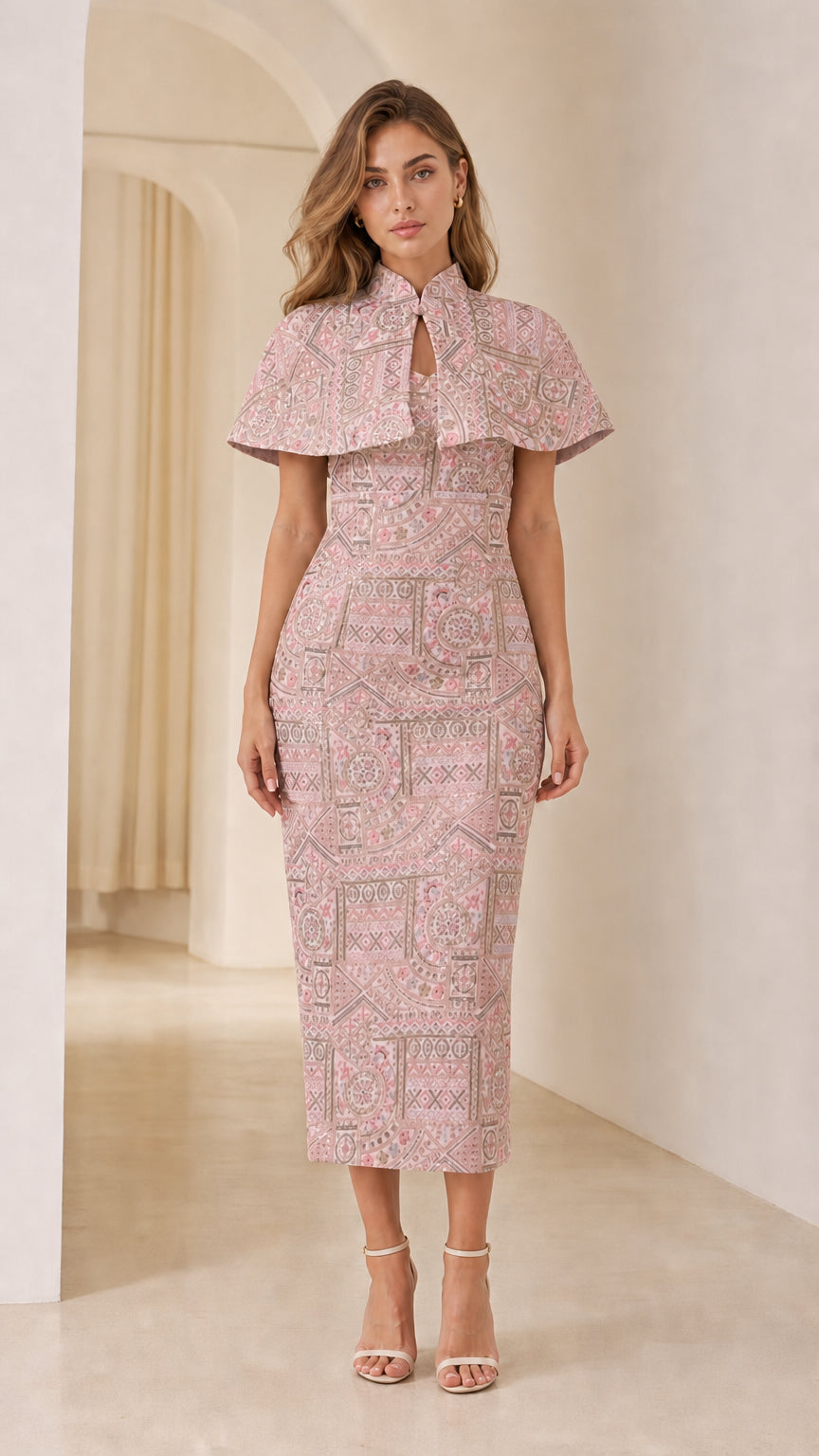 Front view of model wearing Dusty Pink embroidered jacquard capelet midi dress