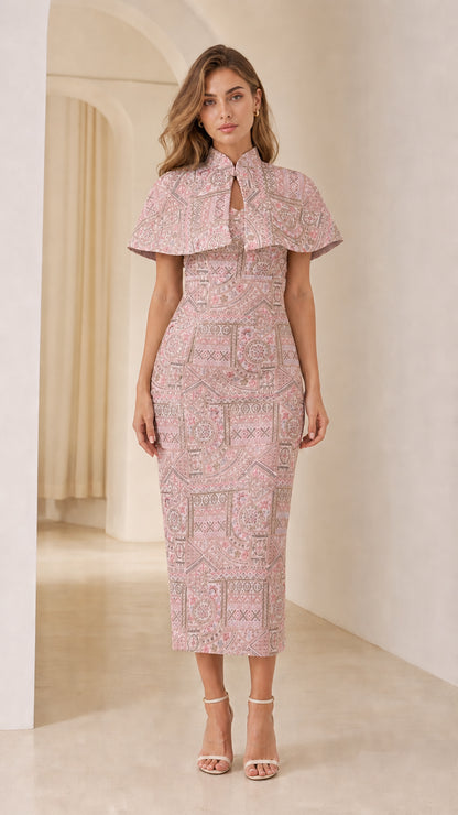 Front view of model wearing Dusty Pink embroidered jacquard capelet midi dress