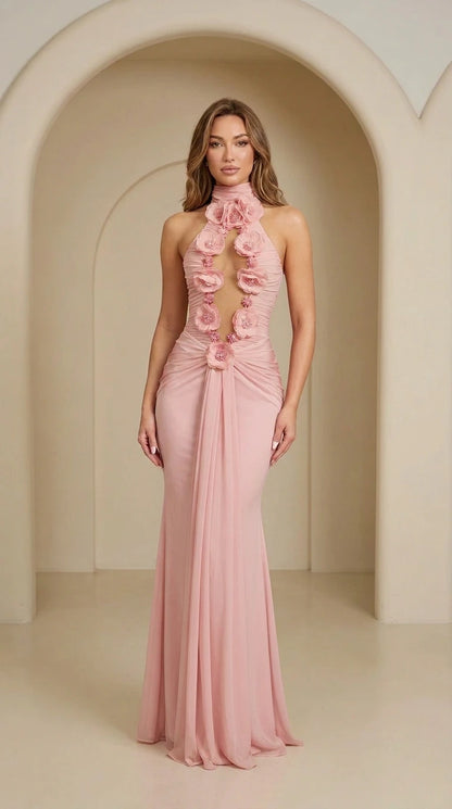Front view of pink halter neck rosette evening gown