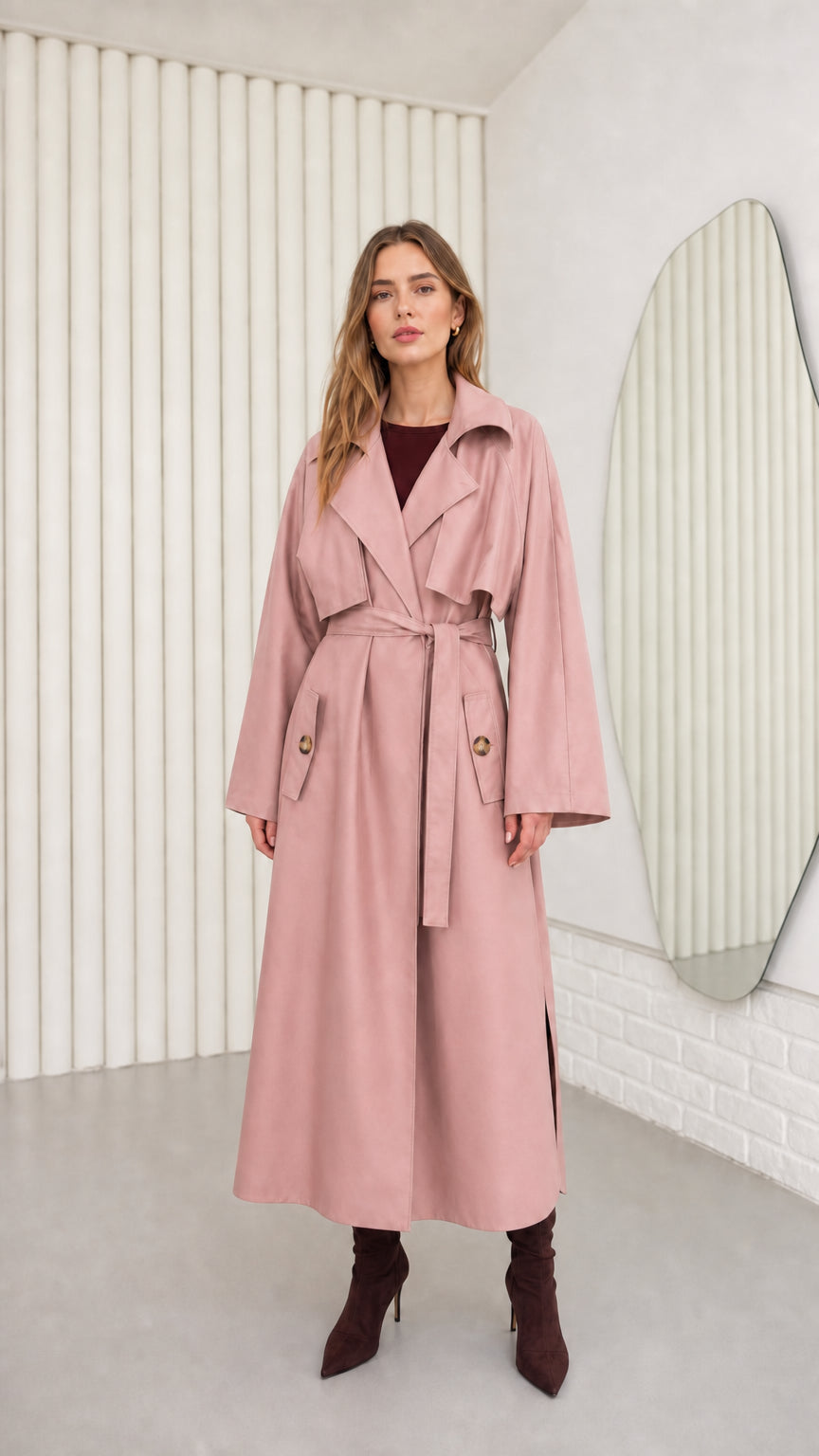 Model wearing Dusty Pink longline belted trench coat