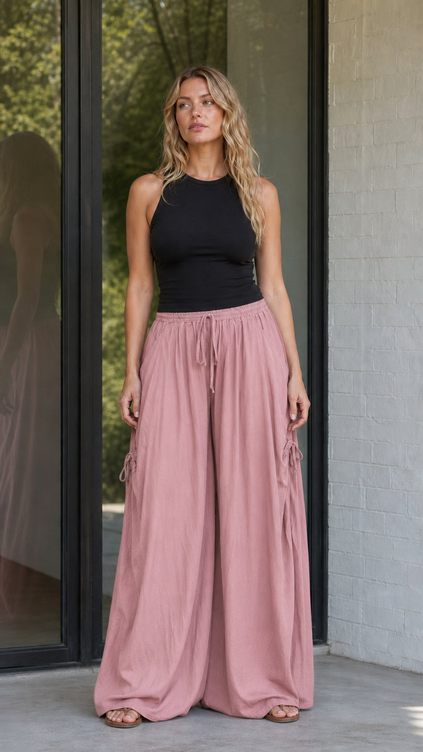 Front view of dusty pink wide-leg drawstring pants