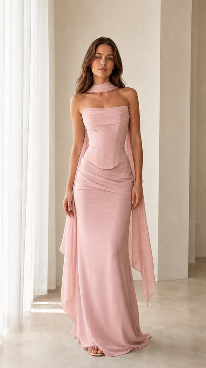 Model wearing the Blush Pink strapless corset formal gown