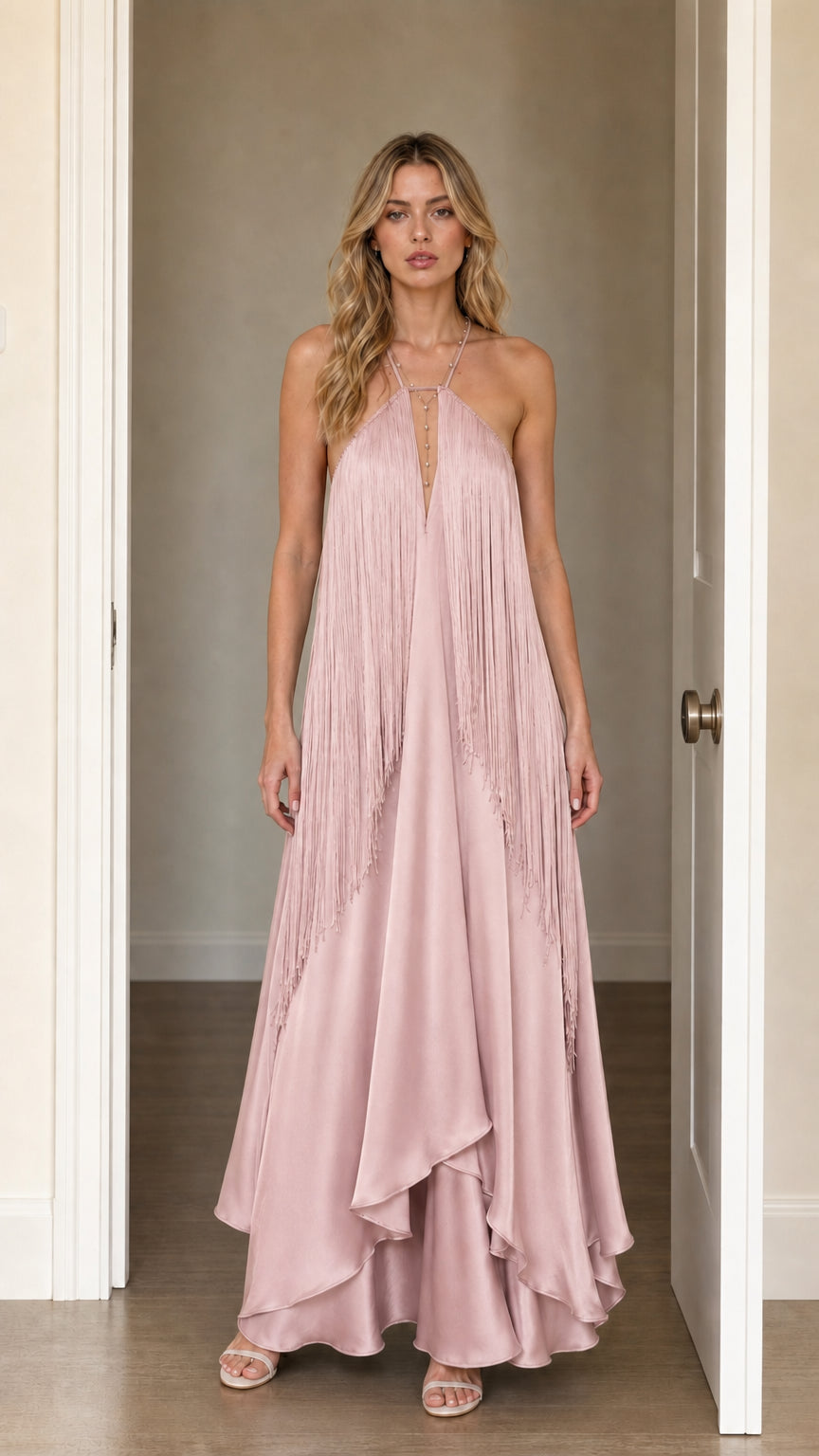 Front view of model wearing Dusty Pink halter fringe maxi dress