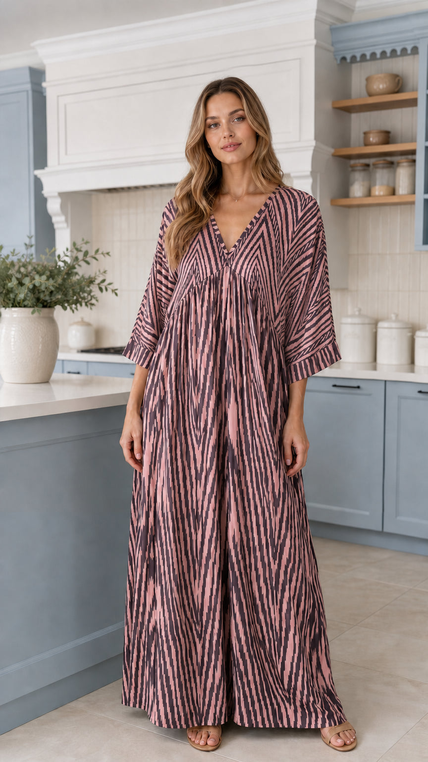 Front view of woman wearing Dusty Pink printed kimono-sleeve maxi jumpsuit