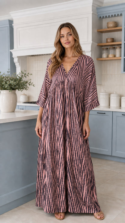 Front view of woman wearing Dusty Pink printed kimono-sleeve maxi jumpsuit