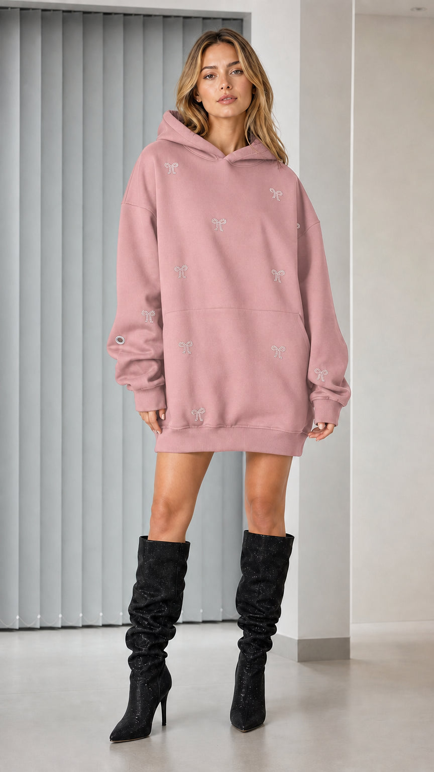 Full-length view of pink rhinestone bow oversized hoodie dress