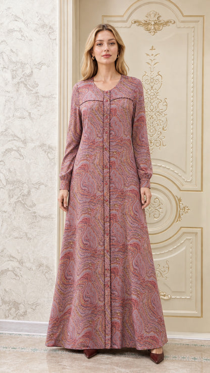 Front view of model wearing dusty rose pink swirl print long sleeve maxi dress