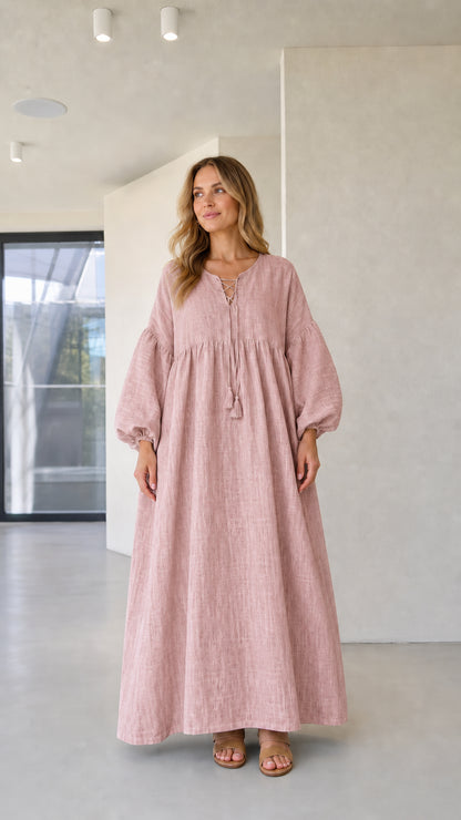 Model wearing blush pink boho textured gathered maxi dress