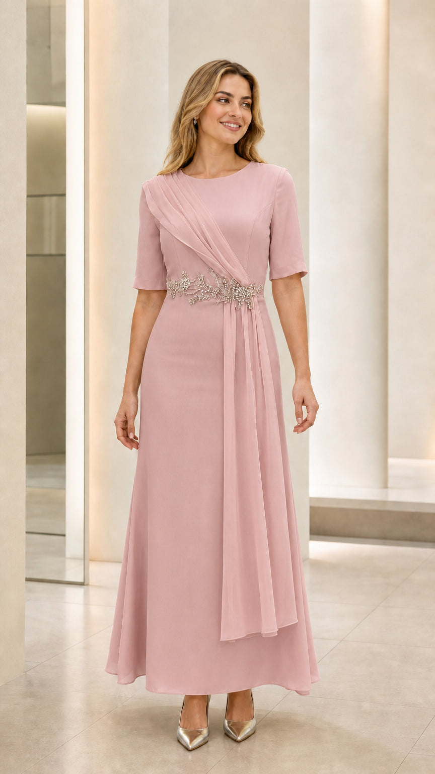 Front view of model wearing dusty pink draped evening maxi dress with beaded waist