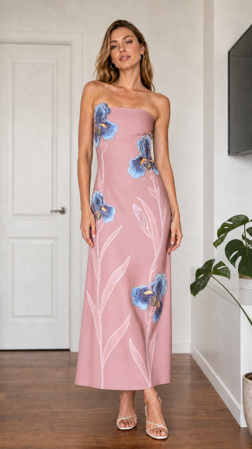 Model wearing dusty pink strapless floral embroidered maxi dress