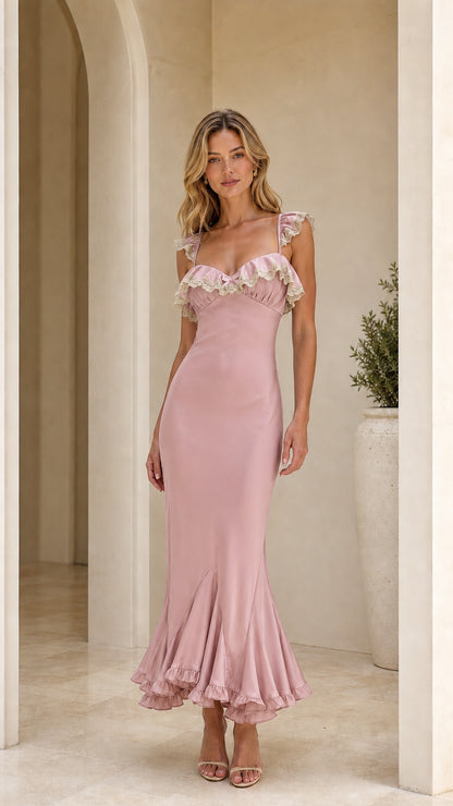 Model wearing pink ruffle trim maxi dress