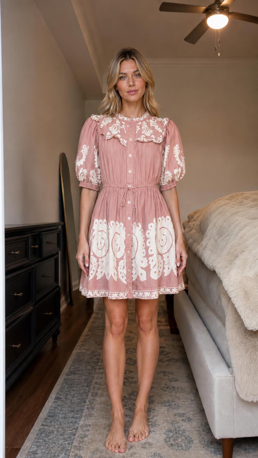Front view of pink boho embroidered mini dress