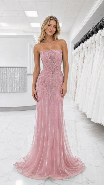 Front view of blush pink beaded strapless evening dress