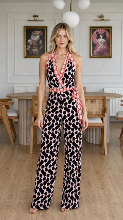 Front view of black and pink color variant jumpsuit
