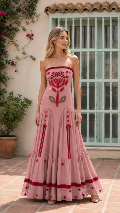 Front view of pink strapless embroidered maxi dress