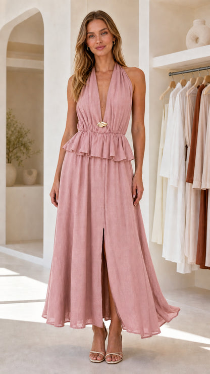 Front view of dusty pink halter neck peplum maxi dress