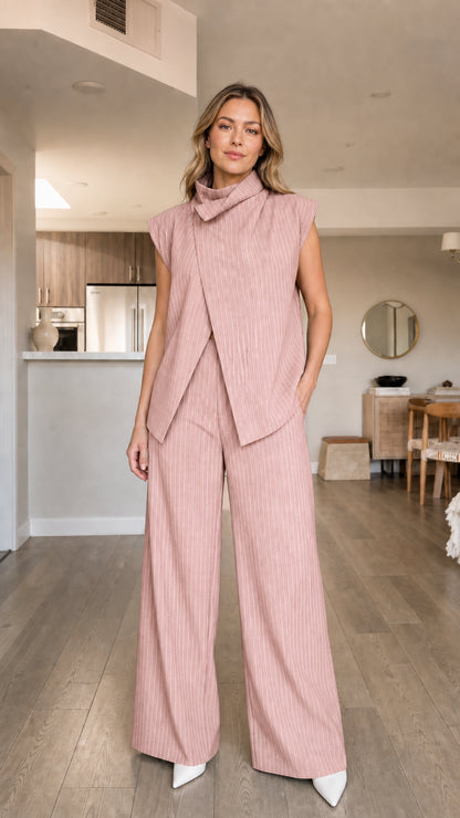 Model wearing pink pinstripe matching set