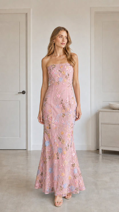 Front view of pink floral embroidered strapless maxi dress