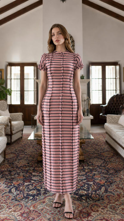 Model wearing pink striped maxi dress variant
