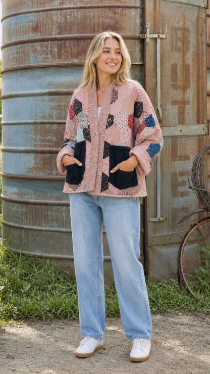 Dusty pink hexagon patchwork quilted jacket on model