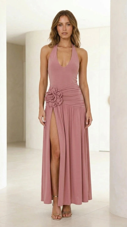 Front view of model wearing dusty pink halter neck maxi dress