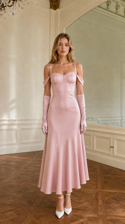 Full-length view of blush pink cold-shoulder bustier satin midi dress
