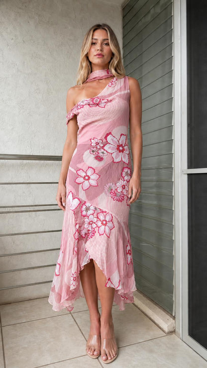 Model wearing soft pink one-shoulder floral print ruffle midi dress