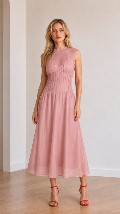 Front view of model wearing pink sleeveless midi dress