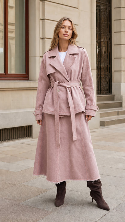 Woman wearing Dusty Pink belted trench jacket and matching long skirt set