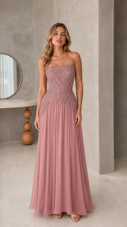 Front view of strapless dusty rose pink beaded corset formal maxi gown