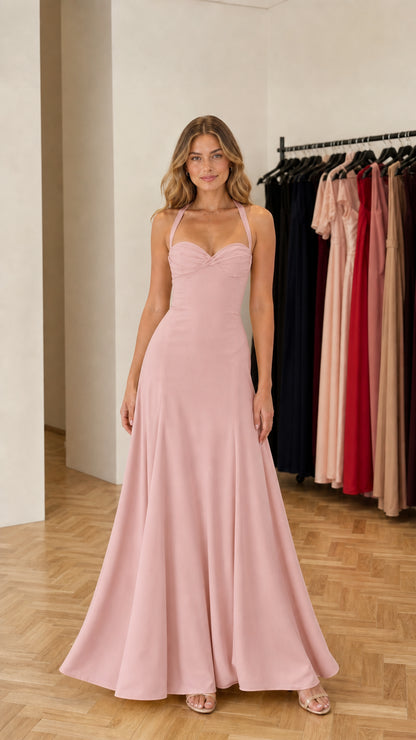 Model wearing pink formal maxi dress