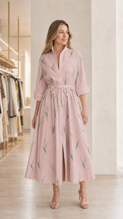 Model wearing pink floral midi shirt dress