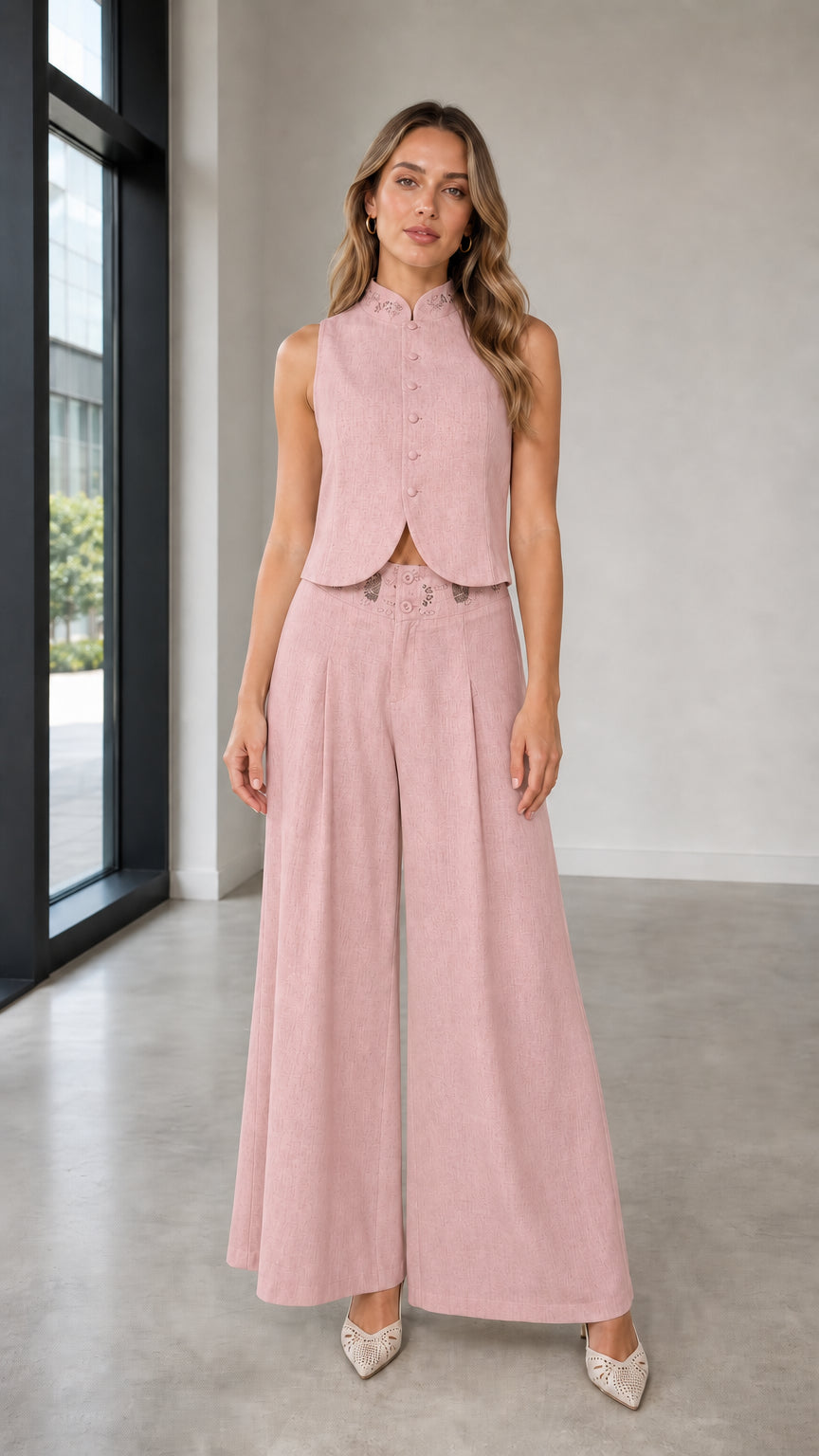 Full-body view of woman in pink two-piece set