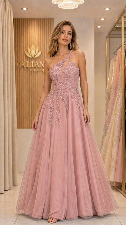 Front view of woman wearing dusty rose one-shoulder beaded tulle evening gown