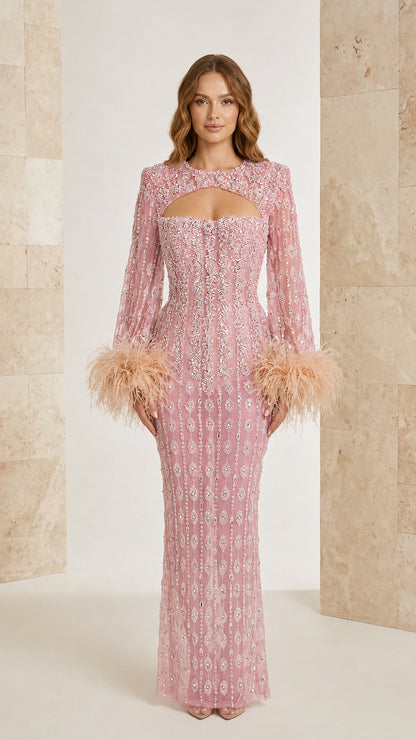 Pink beaded long sleeve maxi evening gown with feather cuffs and cutout neckline